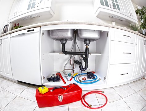 Plumber tools on the kitchen.