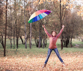 happy girl with umbrella outdoor