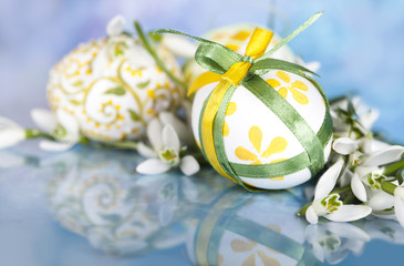 Easter eggs  and snowdrops white