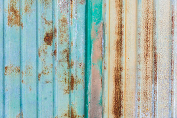 Old rusty steel fence closeup