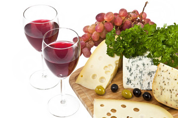 Cheese, wine, grapes, olives and parsley