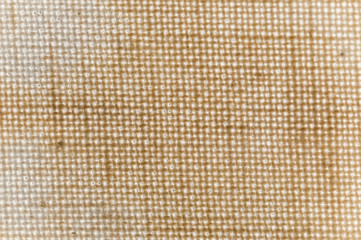 Texture of a yellow brown canvas