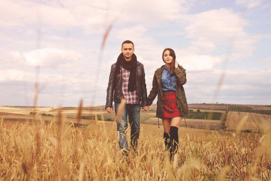 Landscape portrait of young beautiful stylish couple sensual and