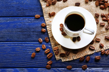 Cup of coffee on wooden table