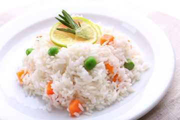Vegetable rice served on table, close-up