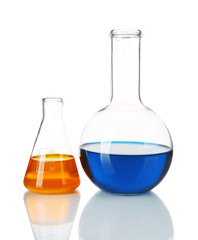 Two flasks with blue and orange fluid isolated on white