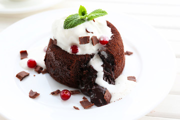 Hot chocolate pudding with fondant centre with ice-cream,
