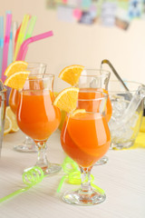 Glasses of fruit cocktails in party close-up