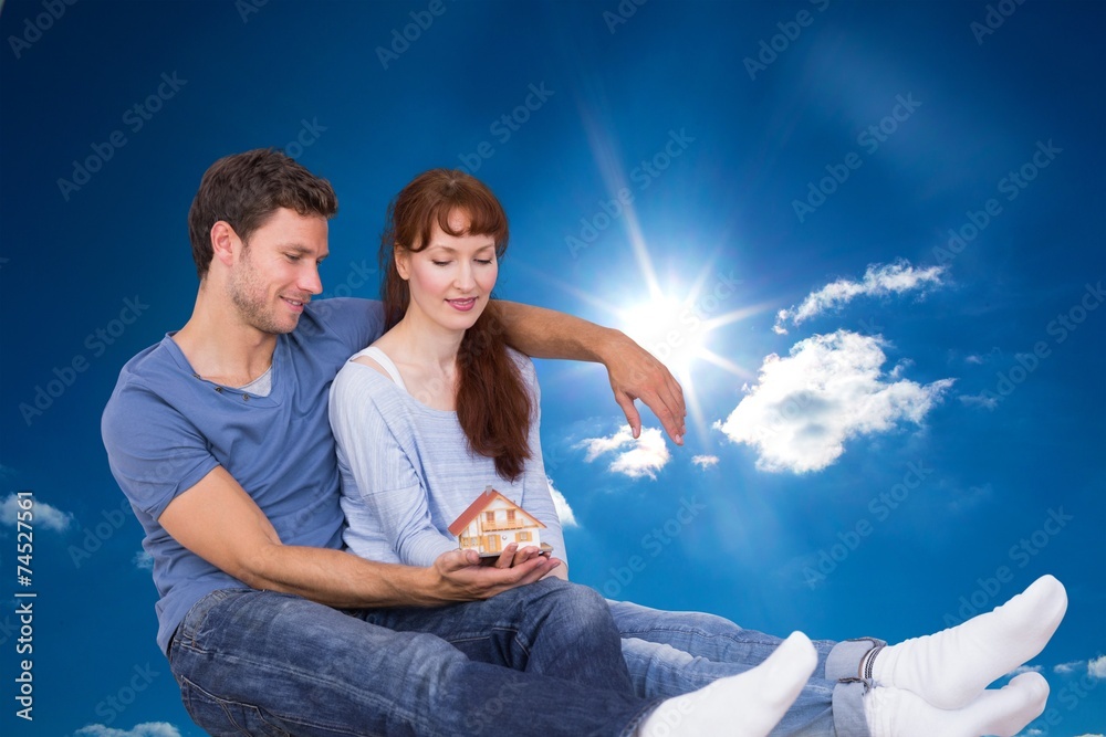 Poster composite image of couple using tablet at home