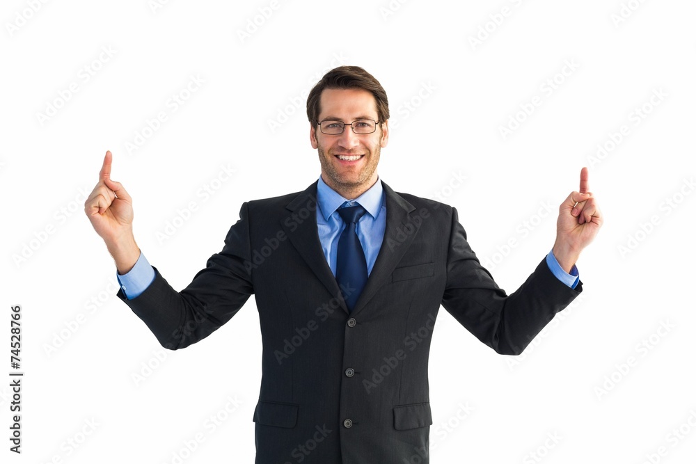 Poster Smiling businessman pointing with both fingers