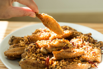 Fried chicken wings mixed herbs.