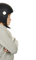 Boy with black moto helmet