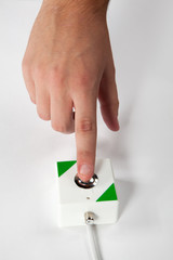 press the button with finger, on white background