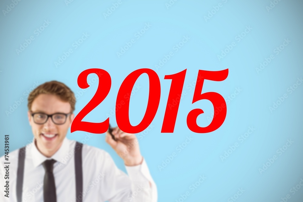 Poster Composite image of geeky businessman writing with marker