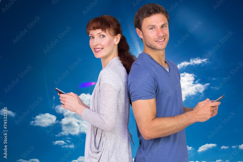 Aufkleber Composite image of couple both sending text messages