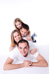 isolated studio shot of happy family on white background