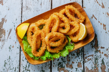 fried squid rings breaded with lemon