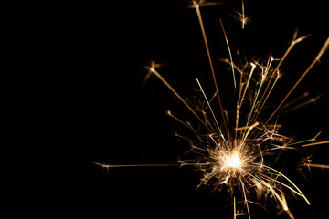 Christmas sparkler on black background