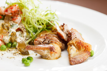 Russian salad with quail