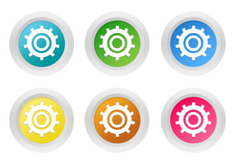 Set of rounded colorful buttons with gears symbol