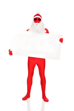 Full length santa man holding empty banner