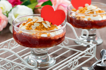dessert with berry jam and whipped cream for Valentine's Day
