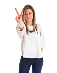 Woman doing victory gesture