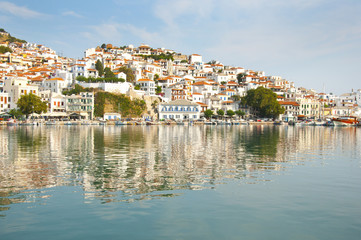 Fototapeta na wymiar Reflection of city of Skopelos