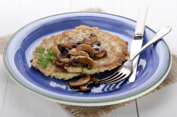 potato pancake on a blue plate