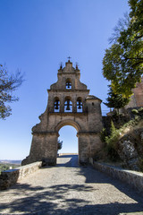 Fototapeta na wymiar landmark arc bell tower entrance located in Aracena