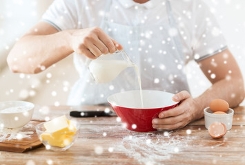 close up of man pouring milk into bowl