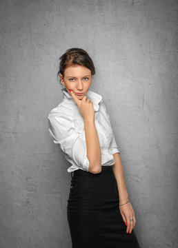 Pretty young woman in office clothes