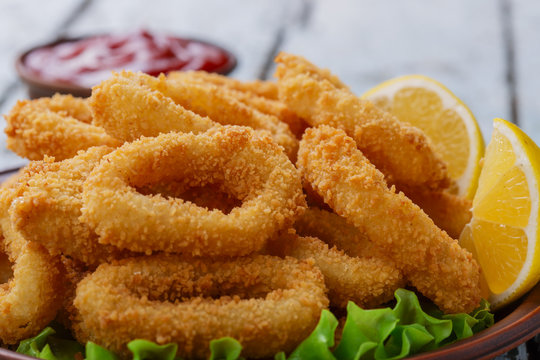 fried squid rings, breaded with lemon