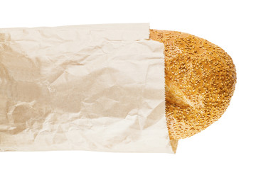 bread with sesame seeds in a paper