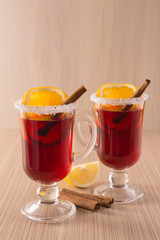 mulled wine in clear glass mug