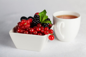 blackberry, currant and mint with a cup of tea