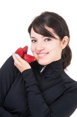 closeup portrait young girl holding red strawberries