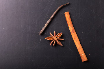 Close up of winter spices , cinnamon, anise, vanilla and brown s