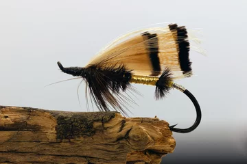 Fotobehang Golden fly fishing lure © hans_chr