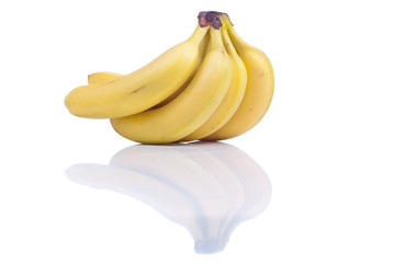 ripe yellow bananas isolated on white background with reflection