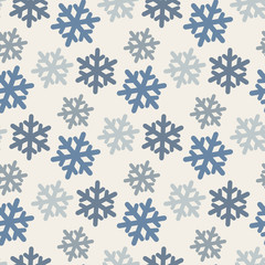 Seamless pattern with colorful snowflakes in blue tones