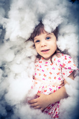 little girl laying on the floor