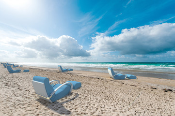 Fototapeta na wymiar Relaxing seats on the beach