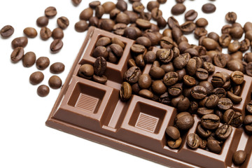 Chocolate bar with coffee beans close-up
