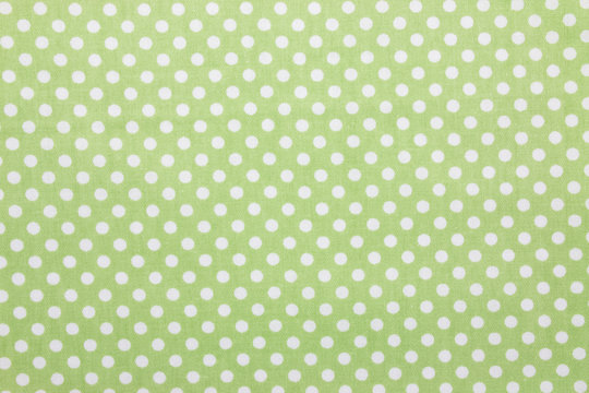 green polka dot fabric