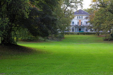 Fototapeta premium The view of the house in the park