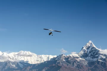 Crédence de cuisine en verre imprimé Népal Ultra light flight over the Annapurna in Nepal