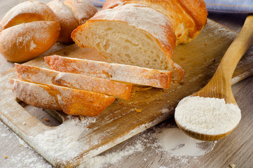 fresh white loaf  on  wooden board.