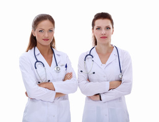 Two young woman doctor , standing in hospital