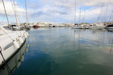 Fototapeta premium Yachts and sail boats in a marina port